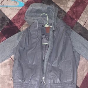 gray leather and hoodie jacket